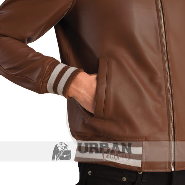 Men's black leather bomber jacket with ribbed cuffs and zipper, perfect for casual or semi-formal wear."